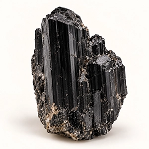 A black tourmaline crystal with long striations
